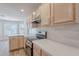 Bright kitchen featuring modern appliances, stylish cabinetry, and durable countertops at 2647 N Miller Rd # 6, Scottsdale, AZ 85257