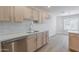 Modern kitchen featuring stainless steel appliances, a sleek countertop, and stylish cabinetry at 2647 N Miller Rd # 6, Scottsdale, AZ 85257