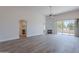 Spacious living room boasts fireplace, high ceilings, lots of natural light, and luxury vinyl flooring at 2647 N Miller Rd # 6, Scottsdale, AZ 85257