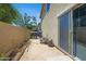 Enclosed yard with sliding glass door access, plants, and plenty of space at 2715 N 73Rd Dr, Phoenix, AZ 85035