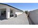 This backyard features low maintenance landscaping at 2790 W Cholla St, Apache Junction, AZ 85120