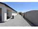 Backyard with low maintenance landscaping and large patio at 2790 W Cholla St, Apache Junction, AZ 85120
