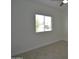 Bedroom with a bright window, neutral walls, and light-colored flooring, creating a serene atmosphere at 2790 W Cholla St, Apache Junction, AZ 85120