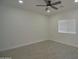 Comfortable bedroom with wood-look flooring and plenty of natural light at 2790 W Cholla St, Apache Junction, AZ 85120