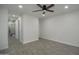 Bright bedroom boasts tile floors, recessed lighting, and ensuite bathroom at 2790 W Cholla St, Apache Junction, AZ 85120