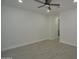 Spacious bedroom featuring a ceiling fan and modern flooring at 2790 W Cholla St, Apache Junction, AZ 85120