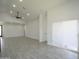 Bright living room with ample space, high ceilings, and natural light at 2790 W Cholla St, Apache Junction, AZ 85120