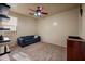 Bedroom featuring a cozy seating area, neutral carpet, and lots of natural light at 3147 E Vallejo Dr, Gilbert, AZ 85298