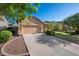 A well-maintained single-Gathering home with a two-car garage and attractive landscaping at 3147 E Vallejo Dr, Gilbert, AZ 85298