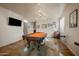 This is a spacious game room featuring a pool table, and decorated with wall art at 3147 E Vallejo Dr, Gilbert, AZ 85298
