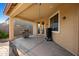 Covered patio featuring outdoor grill and convenient access to indoor living space at 3147 E Vallejo Dr, Gilbert, AZ 85298