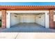 Spacious two-car garage featuring ample storage space with a clean and organized interior at 333 E Caribbean Ln, Phoenix, AZ 85022