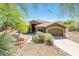 Stunning single-story home featuring a tile roof, low-maintenance landscaping, and an attached two-car garage at 33823 N 2Nd St, Phoenix, AZ 85085