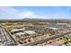 Expansive aerial shot showcasing a new community against a mountain backdrop at 37166 N El Morro Trl, San Tan Valley, AZ 85140