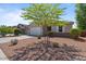 Charming single-story home featuring a well-kept yard and two-car garage at 37166 N El Morro Trl, San Tan Valley, AZ 85140
