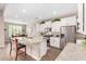 Beautiful kitchen with granite countertops, stainless steel appliances, and ample cabinet space at 37456 W Vera Cruz Dr, Maricopa, AZ 85138