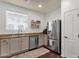 Functional kitchen featuring stainless steel appliances, ample counter space, and modern cabinetry at 3863 S Posse Trl, Gilbert, AZ 85297