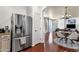 Spacious kitchen featuring stainless steel appliances, granite countertops, and a modern refrigerator at 3863 S Posse Trl, Gilbert, AZ 85297