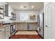 Bright kitchen with stainless steel appliances, ample counter space, and modern cabinetry at 3863 S Posse Trl, Gilbert, AZ 85297