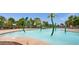 Community splash pad with fun water features for , surrounded by lounge chairs at 3863 S Posse Trl, Gilbert, AZ 85297