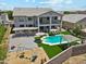 Aerial shot highlighting the expansive backyard, including a pool, bar and play area at 4118 N 304Th Ln, Buckeye, AZ 85396