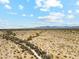 Scenic aerial image showcasing the expansive desert landscape with mountainous horizon at 4118 N 304Th Ln, Buckeye, AZ 85396