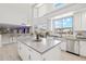 Island features a large window, stainless steel sink, and stainless steel dishwasher at 4118 N 304Th Ln, Buckeye, AZ 85396