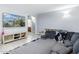 Comfortable living room features a TV and wood-look floors at 4118 N 304Th Ln, Buckeye, AZ 85396