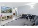 Cozy living room features a TV and wood-look floors at 4118 N 304Th Ln, Buckeye, AZ 85396