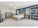Neutral main bedroom with blue accent wall features carpet flooring and natural light at 4118 N 304Th Ln, Buckeye, AZ 85396