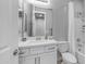 Bathroom featuring a white vanity, modern fixtures, and a shower/tub combo with neutral paint and updated features at 4341 W Pelotazo Way, San Tan Valley, AZ 85144