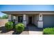 A charming home with a well-maintained front yard and a paved walkway to the front door at 4341 W Pelotazo Way, San Tan Valley, AZ 85144