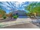 Charming single-story home with a well-manicured front yard, mature trees, and a two-car garage at 6731 S 37Th Dr, Phoenix, AZ 85041