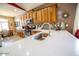 A spacious kitchen features a large countertop with a sink, plenty of cabinets, and modern appliances at 6731 S 37Th Dr, Phoenix, AZ 85041