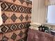 Bathroom featuring a patterned shower curtain, table, and various items at 6960 W Peoria Ave # 156, Peoria, AZ 85345