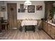 Cozy dining room featuring a quaint table setting, decorative accents, and warm, inviting lighting at 6960 W Peoria Ave # 156, Peoria, AZ 85345