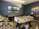 Game room with foosball table, shuffleboard, and modern decor at 6960 W Peoria Ave # 156, Peoria, AZ 85345