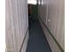 Hallway with paneled walls, leading to another room at 6960 W Peoria Ave # 156, Peoria, AZ 85345