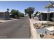 Neighborhood street with various houses at 6960 W Peoria Ave # 156, Peoria, AZ 85345