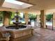 Exterior view of a community pool area with fountain and landscaping at 6960 W Peoria Ave # 156, Peoria, AZ 85345