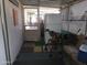 Covered porch with furniture, refrigerator, and decorations at 6960 W Peoria Ave # 156, Peoria, AZ 85345