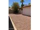 This backyard features low-maintenance landscaping at 708 N Country Club Way, Chandler, AZ 85226