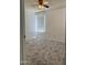 Neutral bedroom with modern ceiling fan, window with blinds, and neutral carpeting at 708 N Country Club Way, Chandler, AZ 85226