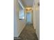 Hallway with new carpet and natural lighting at 708 N Country Club Way, Chandler, AZ 85226