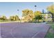 Outdoor community basketball court featuring trees and benches at 717 W Manhatton Dr, Tempe, AZ 85282