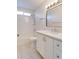 Clean bathroom featuring tiled floor, shower over tub, and a vanity with great lighting at 717 W Manhatton Dr, Tempe, AZ 85282
