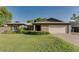 Charming single-story brick home with well-maintained landscaping and a spacious two-car garage at 717 W Manhatton Dr, Tempe, AZ 85282