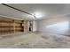 Spacious garage with open shelving, mechanicals, and ample storage space at 717 W Manhatton Dr, Tempe, AZ 85282
