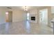 Bright living room with tile flooring, a cozy fireplace, and an open layout for seamless entertaining at 717 W Manhatton Dr, Tempe, AZ 85282