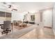 Bright and airy living room with neutral colors and contemporary furnishings at 7413 W Southgate Ave, Phoenix, AZ 85043